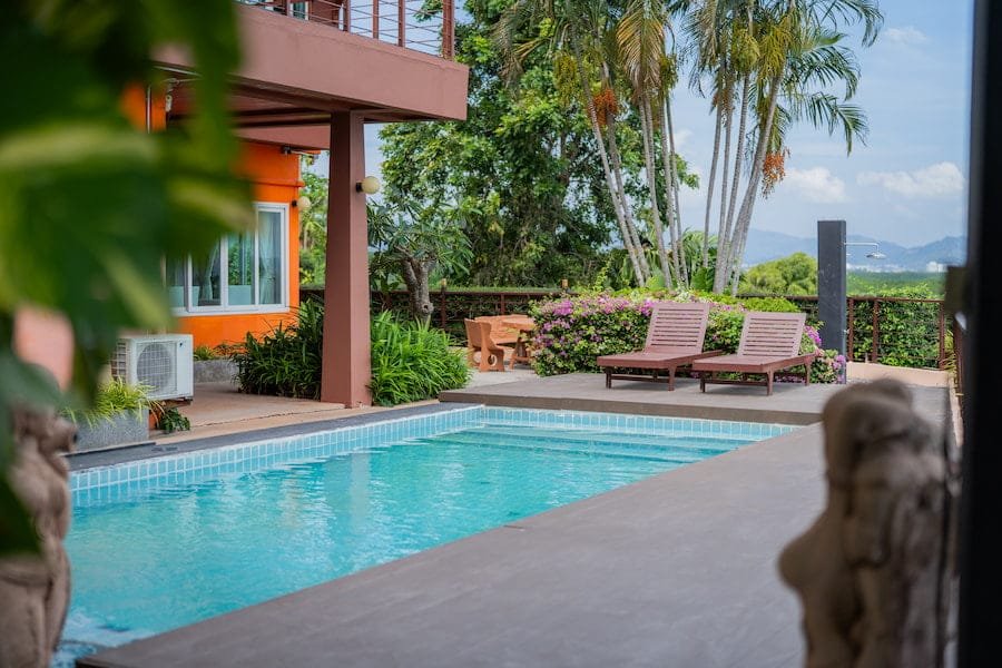 Serene pool at a house with breathtaking mountain views, perfect for relaxation and recovery at a drug rehab Thailand facility.