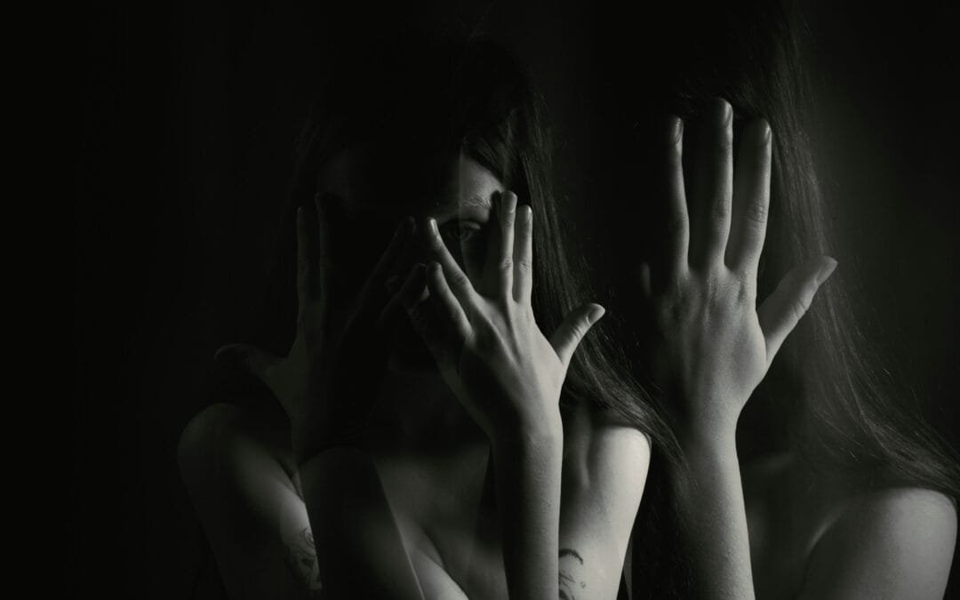 woman with hands on her face - How Does Alcohol Rehab Work?