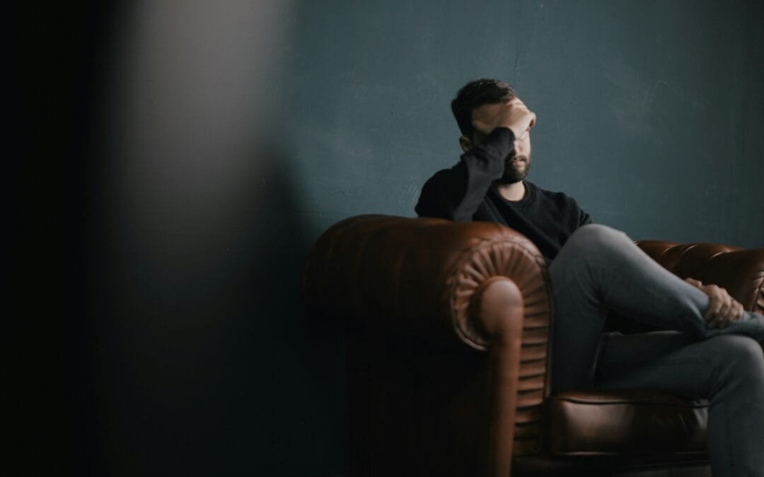 Man having Headache - Alcohol Withdrawal Headache